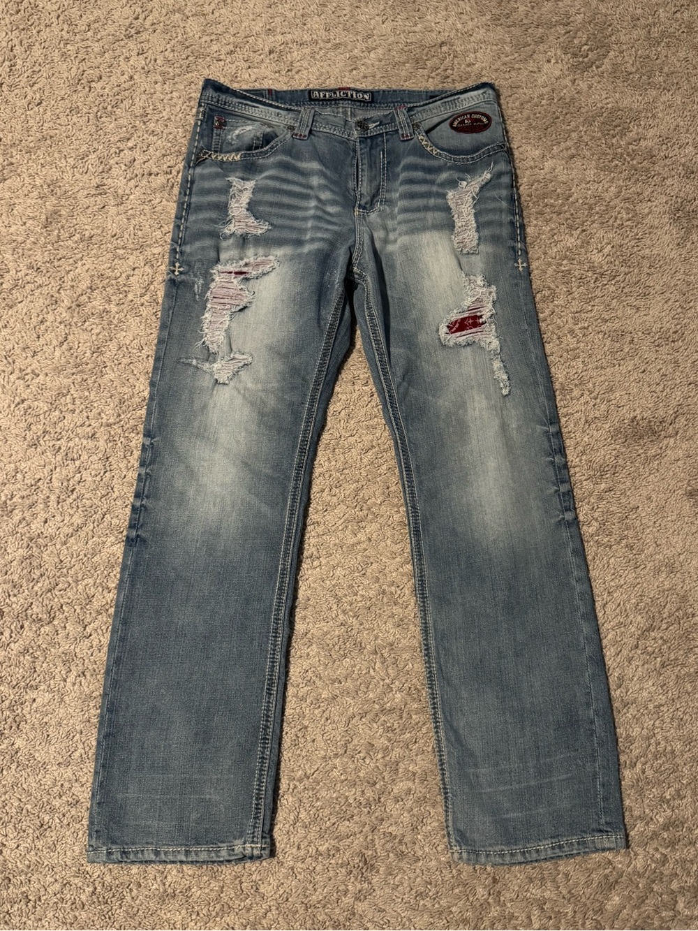 Affliction Men’s Distressed Light Blue Straight Jeans with Red Patch
